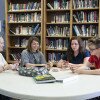 Students playing a game in the library
