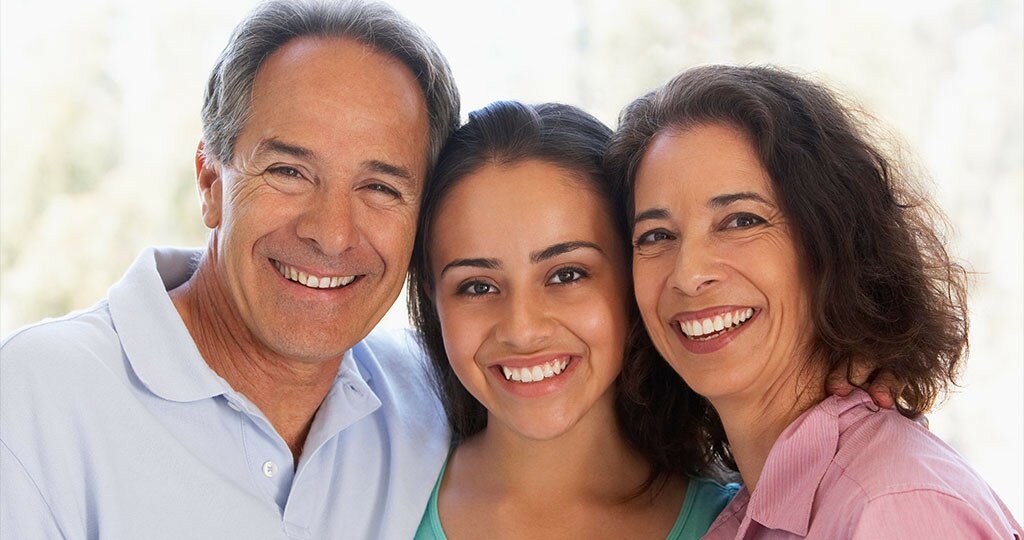 daughter between mother and father